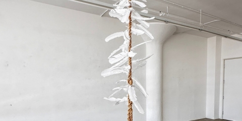 Stairway, 2024, rusted steel, rope, feathers, dimensions variable