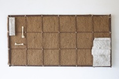 Grid, 2024, rusted steel, stone, bone, dried grass, 19x36 inched